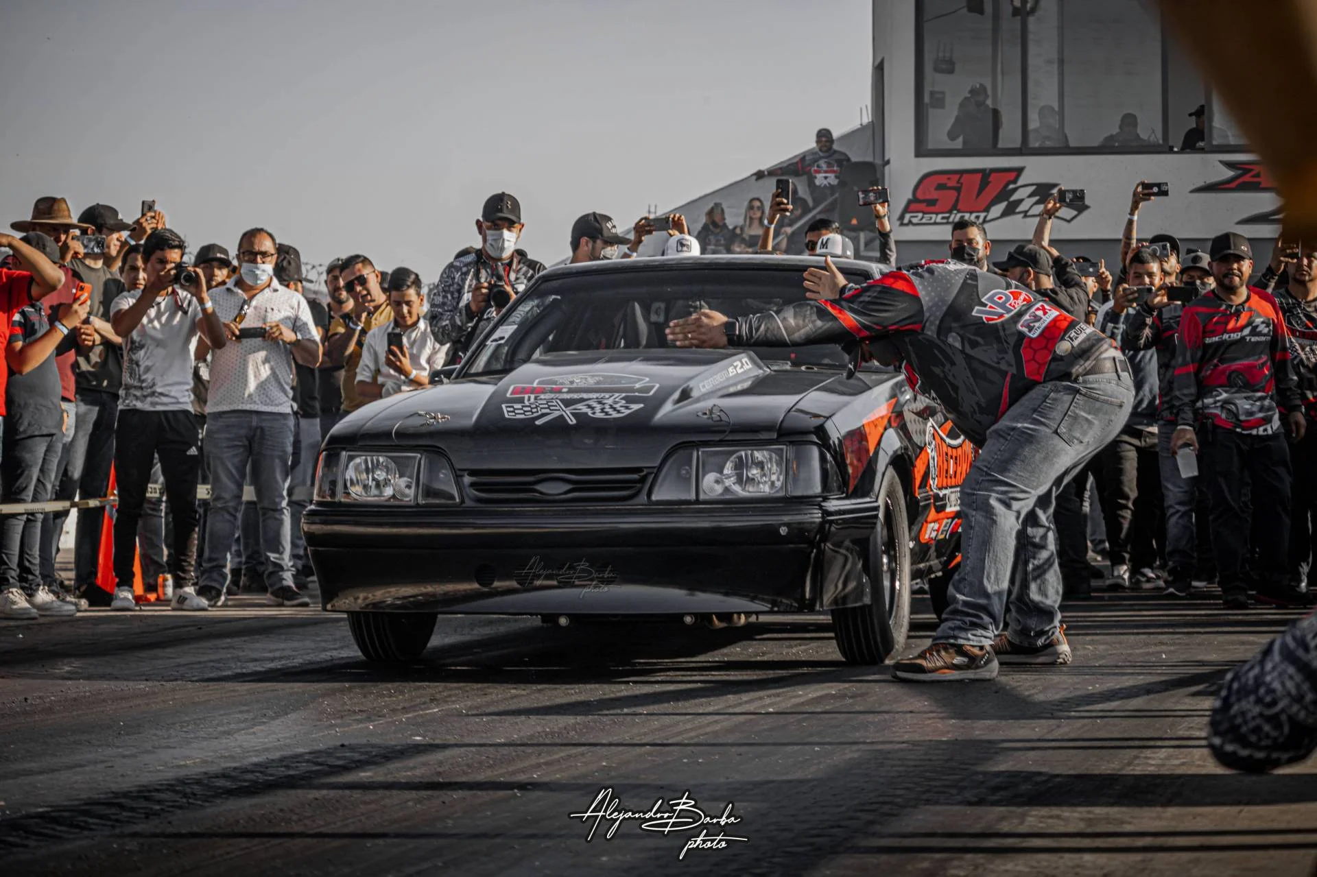 Gilberto Becerra in a 1992 Ford Mustang LX