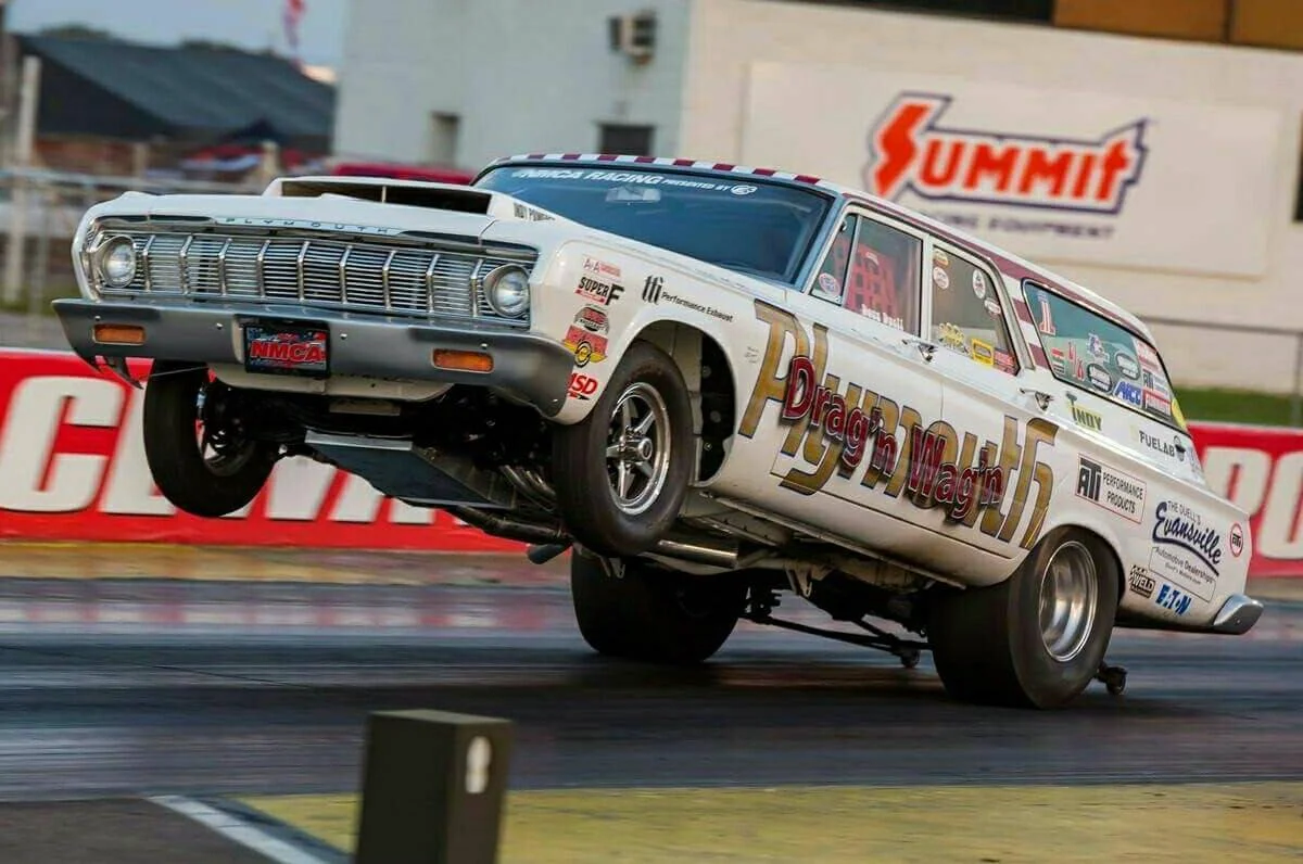 Doug Duell in a 1964 Plymouth Fury Wagon