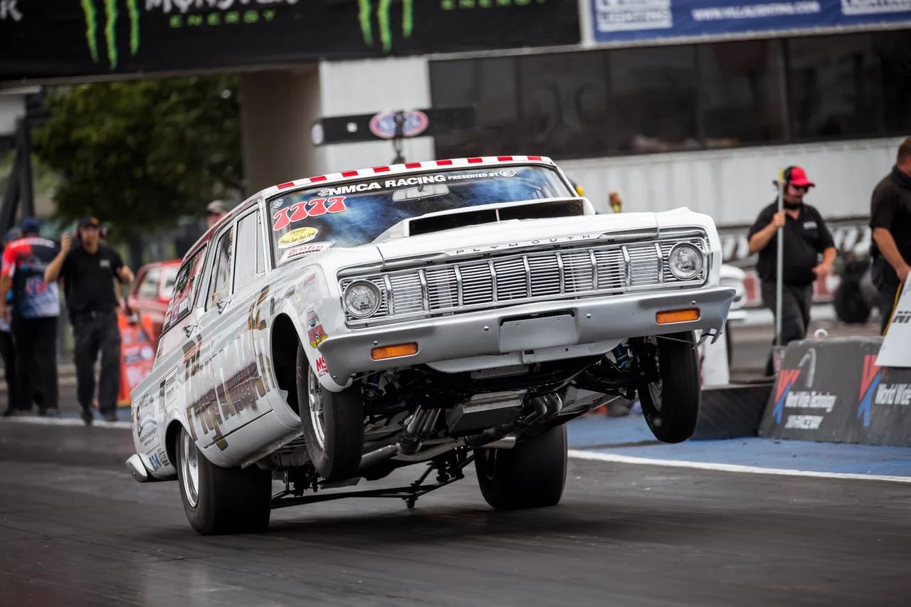 Doug Duell in a 1964 Plymouth Fury Wagon